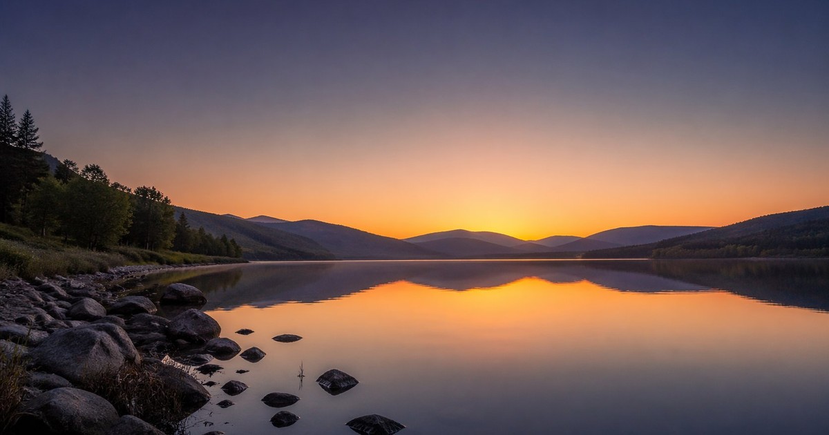 Pre-dawn sunrise over calm water representing the 3AM wake cycle
